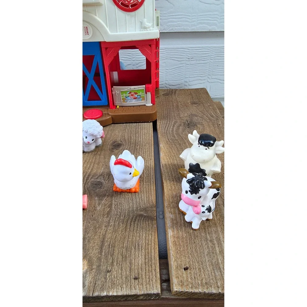 Fisher-Price Little People Caring for Animals Farm Playset with Figures GHT22
